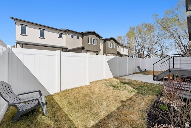2612 S 8550 W, Magna, UT 84044 - view of yard featuring a fenced backyard and a patio
