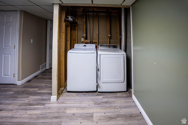 4129 W Misty Dr S, Taylorsville, UT 84129 - laundry room featuring independent washer and dryer, baseboards, and wood finished floors