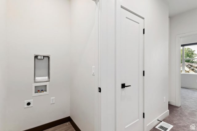 laundry room featuring electric dryer hookup, carpet flooring, visible vents, laundry area, and hookup for a washing machine