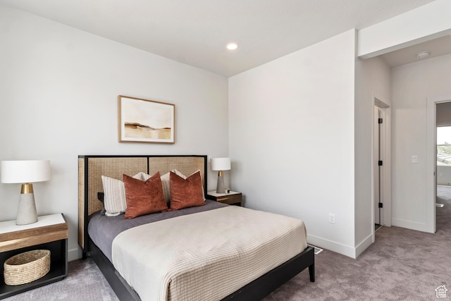 bedroom featuring baseboards, carpet, and recessed lighting