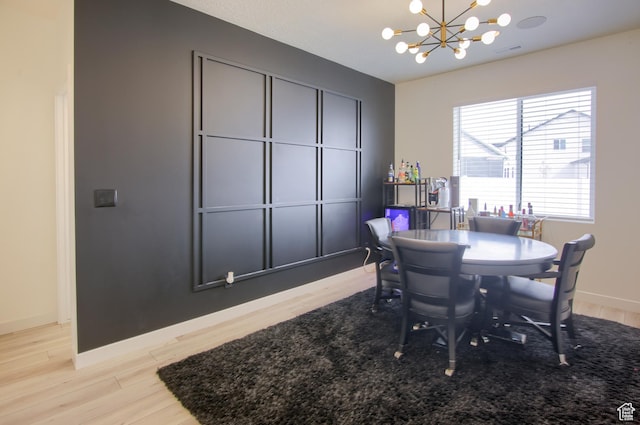 2543 W 3350 S Unit 210, Syracuse, UT 84075 - dining room featuring baseboards, a notable chandelier, light wood-style floors, and visible vents