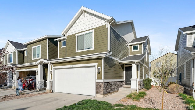 448 S Pegasus Way, Saratoga Springs, UT 84045 - craftsman inspired home featuring driveway, stone siding, and a garage
