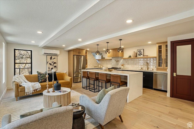5290 E Emigration Canyon Rd, Salt Lake City, UT 84108 - living area with a wall mounted AC, recessed lighting, a textured ceiling, light wood-style floors, and beam ceiling