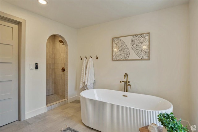 5290 E Emigration Canyon Rd, Salt Lake City, UT 84108 - full bath featuring recessed lighting, baseboards, a tile shower, and a soaking tub