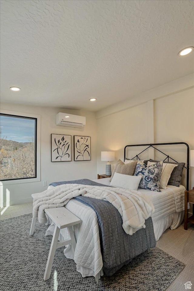 5290 E Emigration Canyon Rd, Salt Lake City, UT 84108 - bedroom featuring recessed lighting, a wall mounted AC, a textured ceiling, and carpet floors