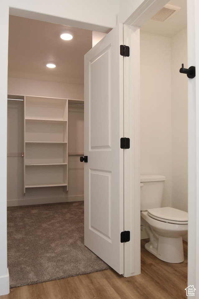685 E 1250 S, Hyrum, UT 84319 - bathroom featuring toilet, recessed lighting, visible vents, and wood finished floors