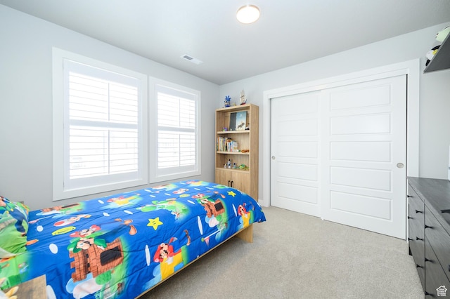 11531 S Bingham Rim Rd, South Jordan, UT 84009 - carpeted bedroom with visible vents and a closet