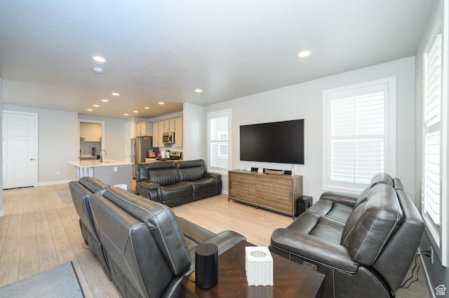 11531 S Bingham Rim Rd, South Jordan, UT 84009 - living area featuring baseboards, recessed lighting, and light wood-style floors