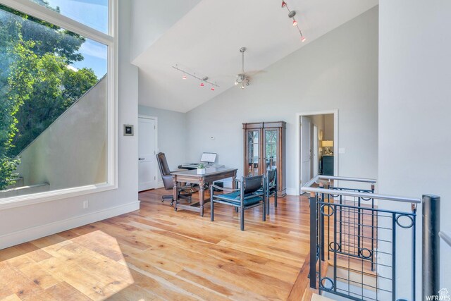 276 S 600 E, Alpine, UT 84004 - dining area with high vaulted ceiling, track lighting, ceiling fan, and wood finished floors