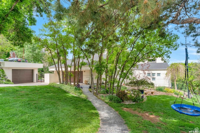 276 S 600 E, Alpine, UT 84004 - ranch-style home with driveway, stucco siding, a front lawn, and a garage