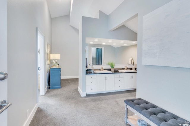 276 S 600 E, Alpine, UT 84004 - bathroom with baseboards, double vanity, vaulted ceiling, recessed lighting, and a sink
