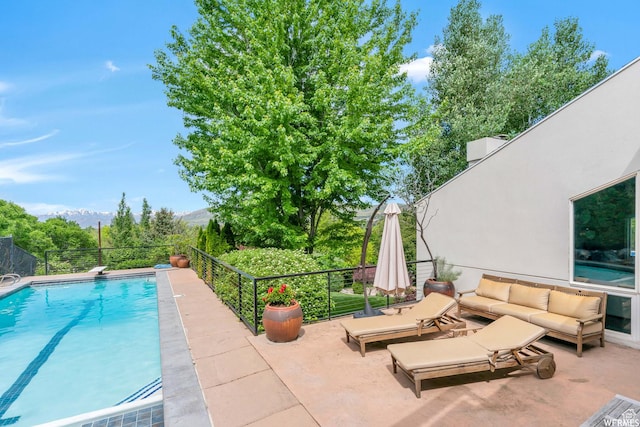 276 S 600 E, Alpine, UT 84004 - view of swimming pool featuring a fenced in pool, a patio area, outdoor lounge area, and a diving board