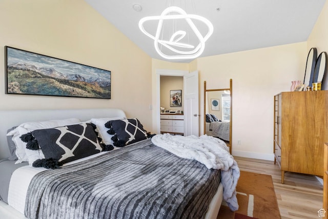473 S 2400 W Unit 3, Springville, UT 84663 - bedroom with a chandelier, light wood-type flooring, and baseboards