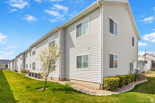 473 S 2400 W Unit 3, Springville, UT 84663 - view of home's exterior featuring central AC unit and a lawn