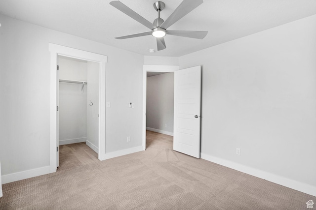 516 W 1000 N, Mapleton, UT 84664 - unfurnished bedroom with a spacious closet, baseboards, a ceiling fan, and light carpet