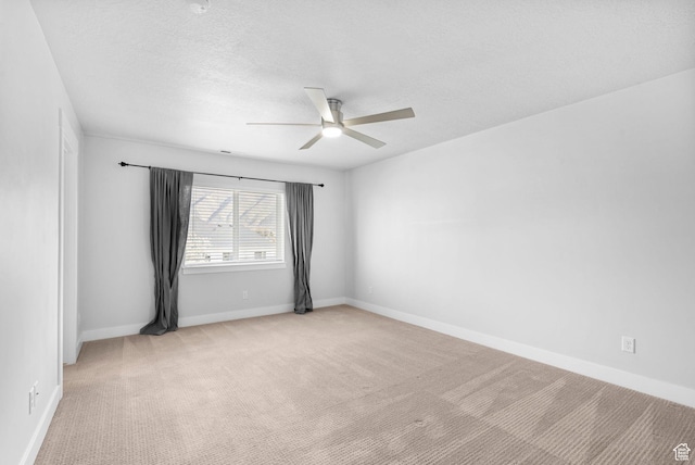 516 W 1000 N, Mapleton, UT 84664 - spare room featuring light carpet, baseboards, a ceiling fan, and a textured ceiling