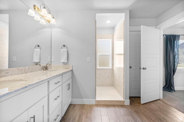 516 W 1000 N, Mapleton, UT 84664 - full bathroom with a sink, a wealth of natural light, and wood finished floors