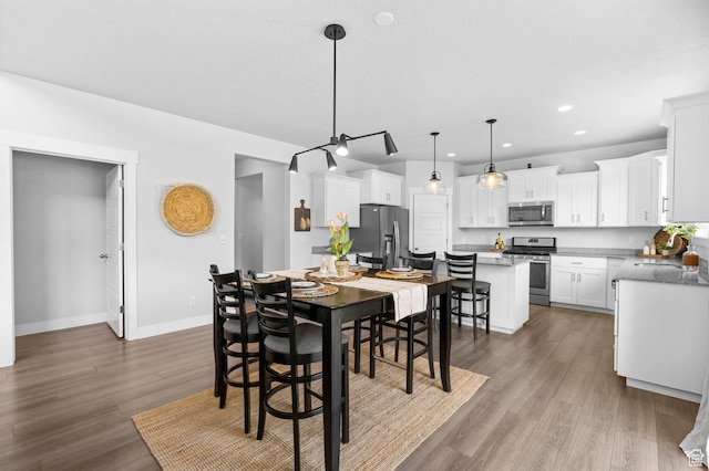 516 W 1000 N, Mapleton, UT 84664 - dining area featuring wood finished floors, baseboards, and recessed lighting