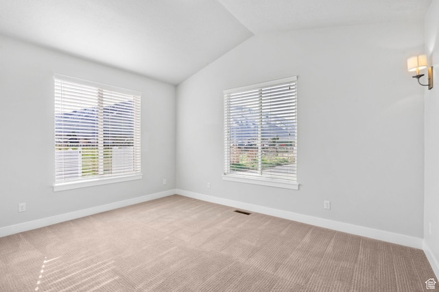 516 W 1000 N, Mapleton, UT 84664 - unfurnished room with visible vents, light colored carpet, baseboards, and lofted ceiling