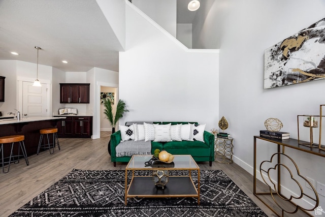 1629 N 3860 W, Lehi, UT 84043 - living area with baseboards, light wood-type flooring, and recessed lighting