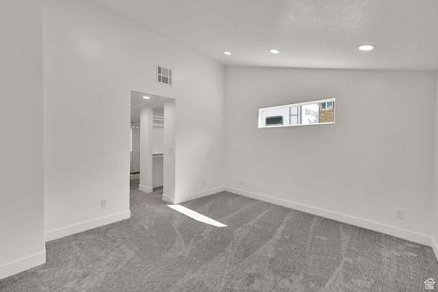 1289 E 31st St S, Ogden, UT 84403 - carpeted spare room featuring recessed lighting, visible vents, baseboards, and vaulted ceiling