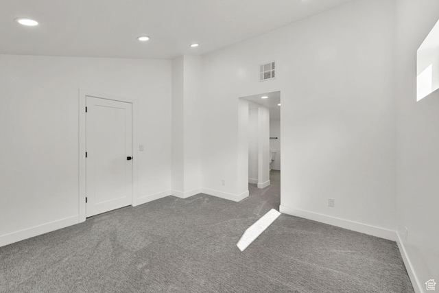 1289 E 31st St S, Ogden, UT 84403 - carpeted spare room with high vaulted ceiling, recessed lighting, visible vents, and baseboards