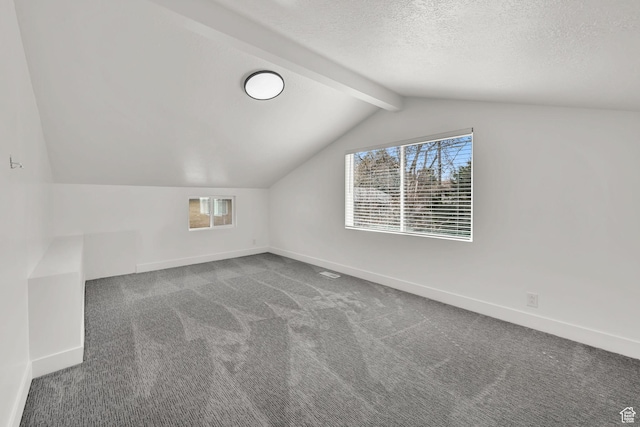 1289 E 31st St S, Ogden, UT 84403 - bonus room with baseboards, carpet, lofted ceiling with beams, and a textured ceiling