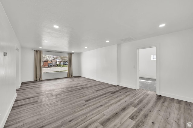 1289 E 31st St S, Ogden, UT 84403 - spare room with recessed lighting, baseboards, and wood finished floors