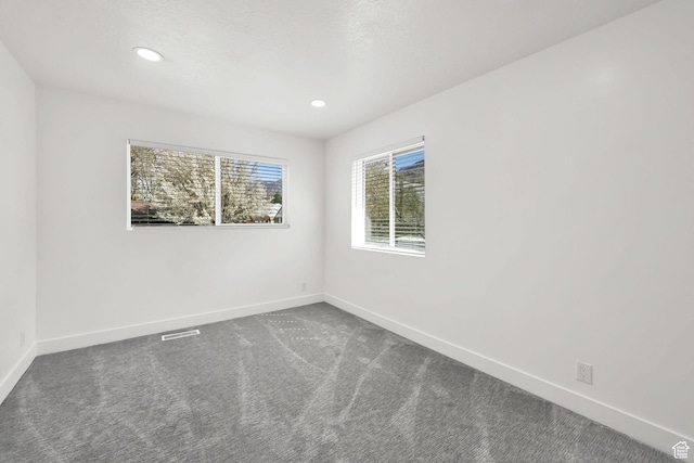 1289 E 31st St S, Ogden, UT 84403 - empty room featuring recessed lighting, carpet, visible vents, and baseboards