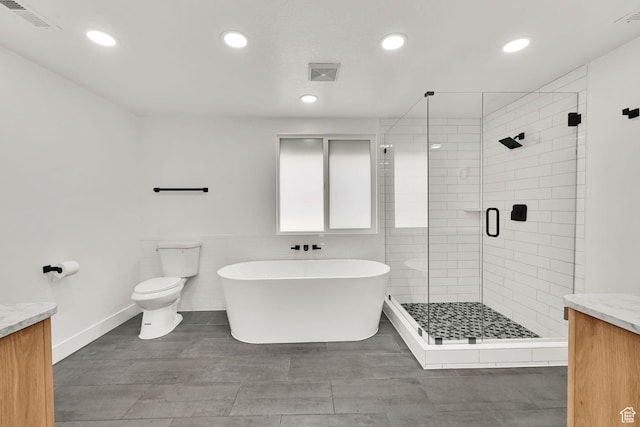1289 E 31st St S, Ogden, UT 84403 - bathroom with a shower stall, recessed lighting, vanity, and a soaking tub