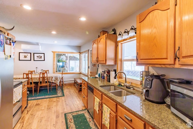 3710 E Provo Canyon Rd S, Provo Canyon, UT 84604 - kitchen with a sink, appliances with stainless steel finishes, light wood finished floors, light stone counters, and recessed lighting