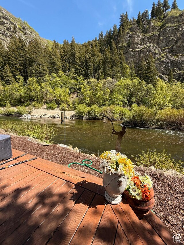 3710 E Provo Canyon Rd S, Provo Canyon, UT 84604 - deck featuring a forest view, a dock, and a water view