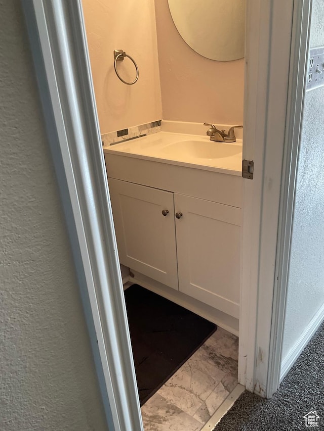 5196 S Gravenstein W, Murray, UT 84123 - bathroom with vanity and a textured wall
