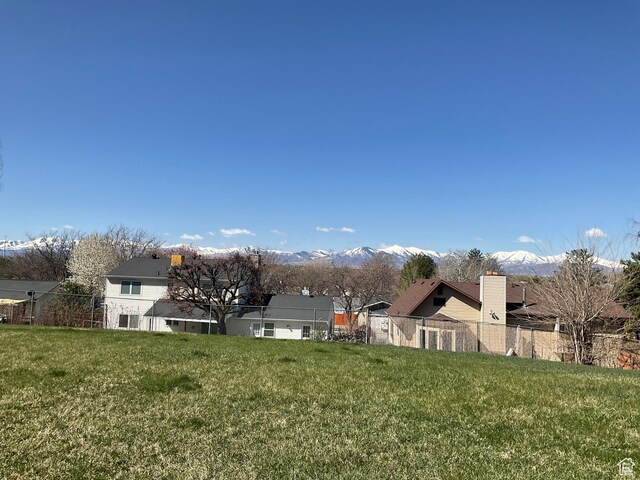 5196 S Gravenstein W, Murray, UT 84123 - view of yard featuring fence and a mountain view