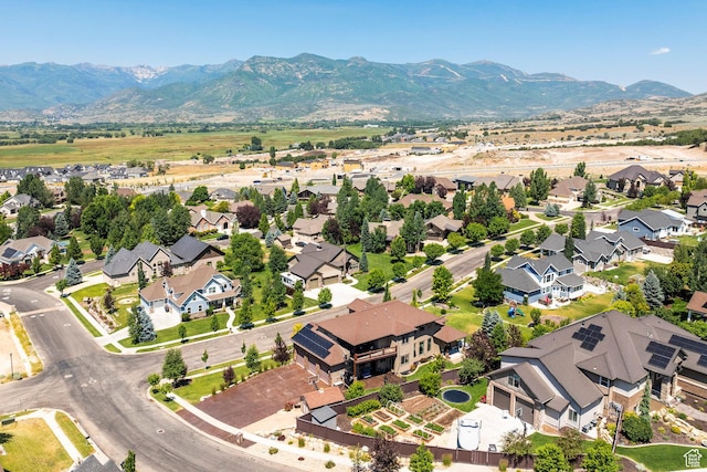 drone / aerial view with a mountain view and a residential view