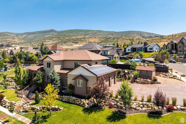 bird's eye view featuring a mountain view and a residential view