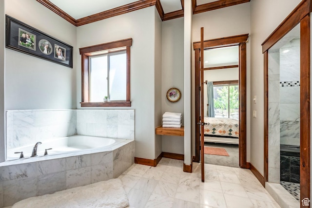 bathroom featuring a tile shower, crown molding, a garden tub, ensuite bathroom, and baseboards