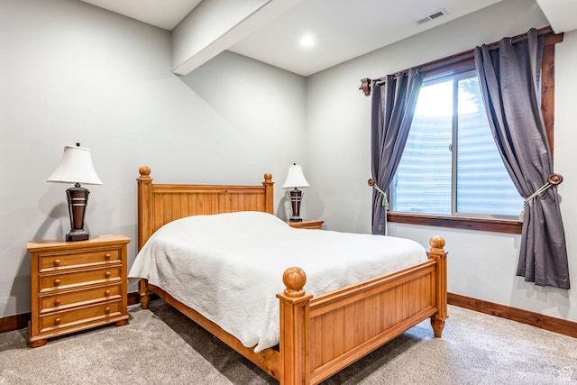 bedroom with carpet flooring, visible vents, and baseboards