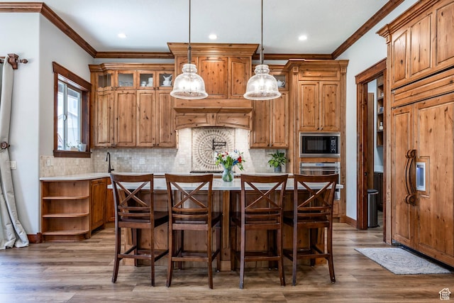 kitchen featuring open shelves, oven, light countertops, black microwave, and decorative backsplash