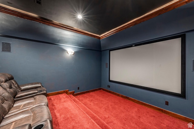 home theater with ornamental molding, baseboards, carpet, and visible vents