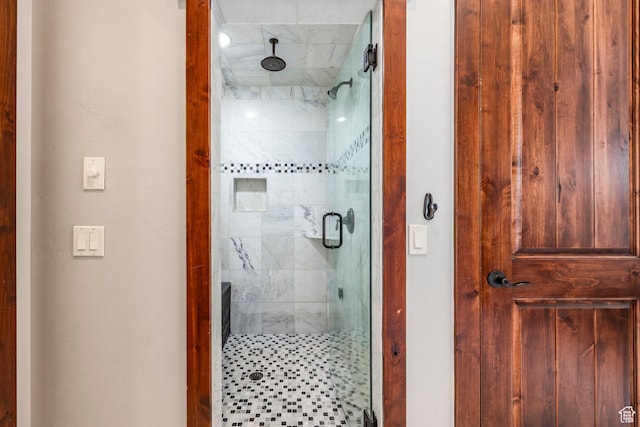 bathroom with a stall shower