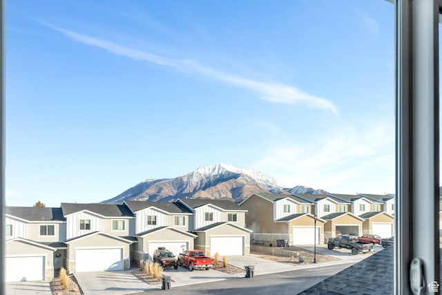 property view of mountains featuring a residential view