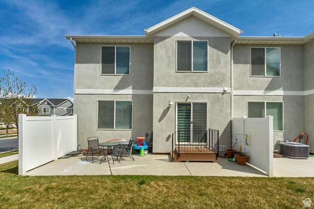 483 S Fox Chase Ln, Saratoga Springs, UT 84045 - back of house featuring a patio, central AC unit, a yard, and fence