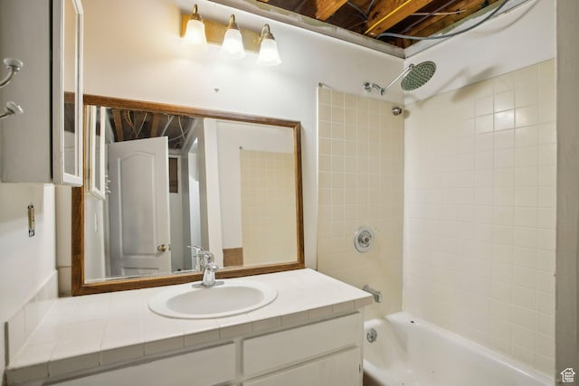 bathroom featuring shower / bathing tub combination and vanity