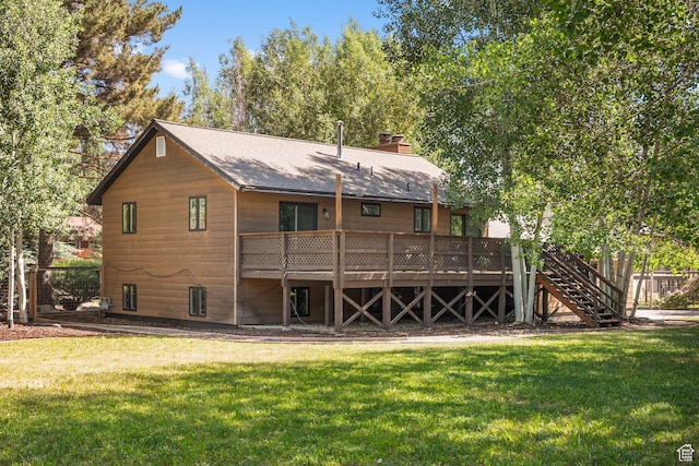745 Quaking Aspen Ct, Park City, UT 84060 - back of property with a lawn, a deck, a chimney, and roof with shingles
