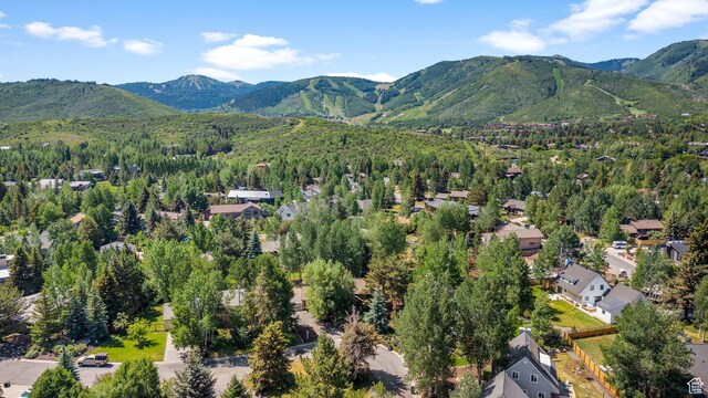 745 Quaking Aspen Ct, Park City, UT 84060 - aerial view of residential area featuring a mountain backdrop and a heavily wooded area
