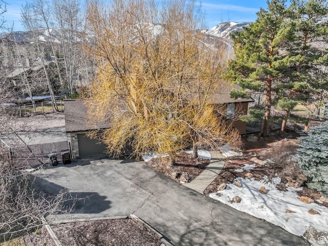 745 Quaking Aspen Ct, Park City, UT 84060 - exterior space with driveway, a mountain view, and an attached garage
