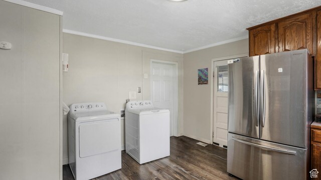 501 E Cross St, Ogden, UT 84404 - laundry room with dark wood-style flooring, washing machine and dryer, and crown molding