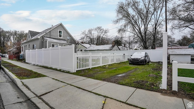501 E Cross St, Ogden, UT 84404 - view of side of property with a fenced front yard