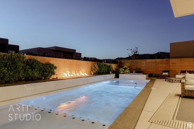 view of pool featuring a fenced backyard